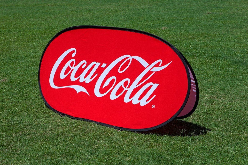 Coca-Cola horizontal pop up banner at outdoor event