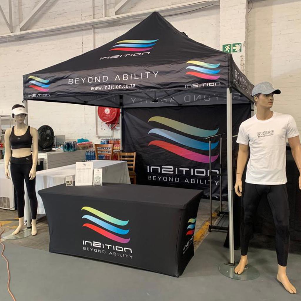 Branded printed tablecloth at exhibition stand