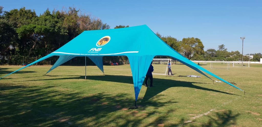 Double Space Shade tensile structure at outdoor event