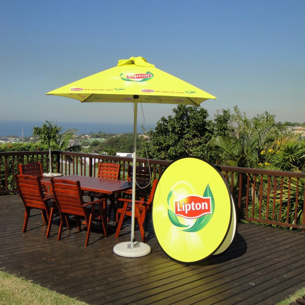 Branded parasols at hospitality venue